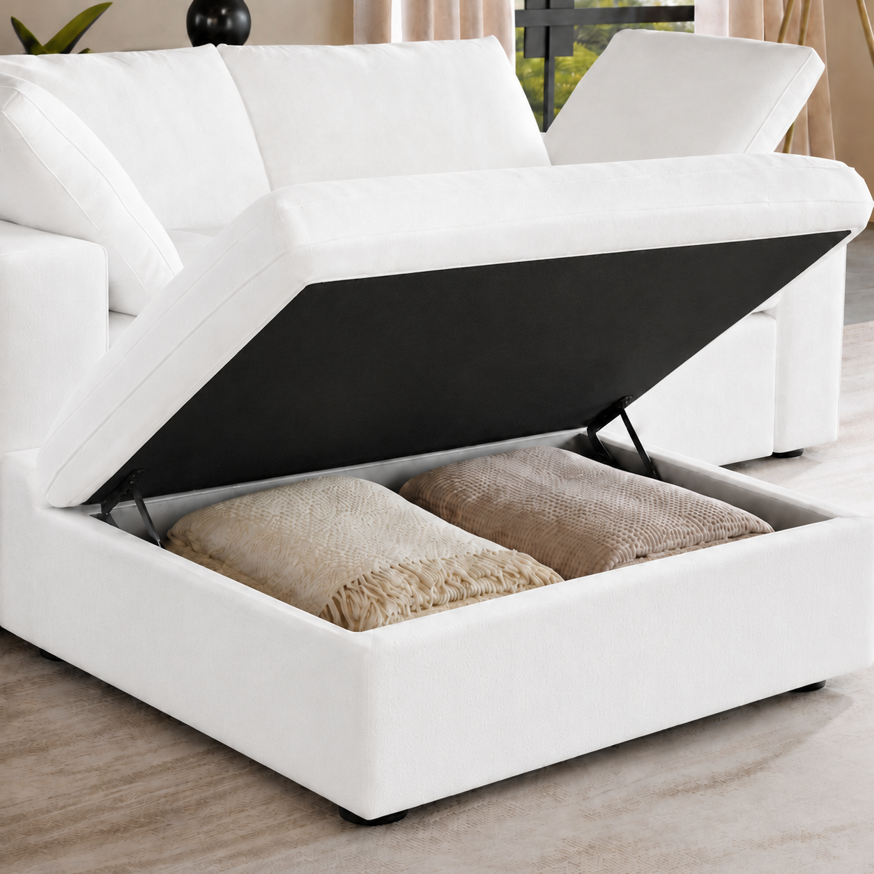 Ascend storage ottoman open with blankets stored inside